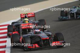 Jenson Button (GBR) McLaren MP4-28 leads Sergio Perez (MEX) McLaren MP4-28. 21.04.2013. Formula 1 World Championship, Rd 4, Bahrain Grand Prix, Sakhir, Bahrain, Race Day