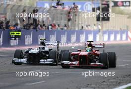 Valtteri Bottas (FIN), Williams F1 Team and Felipe Massa (BRA), Scuderia Ferrari  21.04.2013. Formula 1 World Championship, Rd 4, Bahrain Grand Prix, Sakhir, Bahrain, Race Day