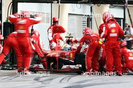 Felipe Massa (BRA) Ferrari F138 makes a pit stop. 21.04.2013. Formula 1 World Championship, Rd 4, Bahrain Grand Prix, Sakhir, Bahrain, Race Day