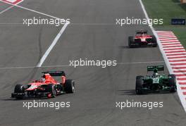Jules Bianchi (FRA), Marussia Formula One Team  and Charles Pic (FRA), Catheram Formula One Team  21.04.2013. Formula 1 World Championship, Rd 4, Bahrain Grand Prix, Sakhir, Bahrain, Race Day