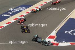 Nico Rosberg (GER) Mercedes AMG F1 W04 leads at the start of the race. 21.04.2013. Formula 1 World Championship, Rd 4, Bahrain Grand Prix, Sakhir, Bahrain, Race Day