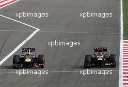 Sebastian Vettel (GER), Red Bull Racing and Kimi Raikkonen (FIN), Lotus F1 Team  21.04.2013. Formula 1 World Championship, Rd 4, Bahrain Grand Prix, Sakhir, Bahrain, Race Day