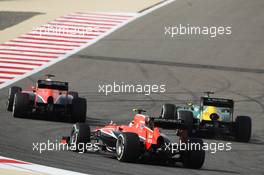 Jules Bianchi (FRA) Marussia F1 Team MR02 leads Charles Pic (FRA) Caterham CT03 and Max Chilton (GBR) Marussia F1 Team MR02. 21.04.2013. Formula 1 World Championship, Rd 4, Bahrain Grand Prix, Sakhir, Bahrain, Race Day