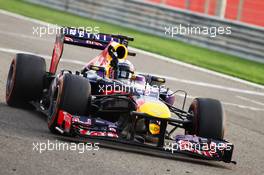 Race winner Sebastian Vettel (GER) Red Bull Racing RB9 celebrates at the end of the race. 21.04.2013. Formula 1 World Championship, Rd 4, Bahrain Grand Prix, Sakhir, Bahrain, Race Day