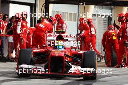 Felipe Massa (BRA) Ferrari F138 makes a pit stop. 21.04.2013. Formula 1 World Championship, Rd 4, Bahrain Grand Prix, Sakhir, Bahrain, Race Day