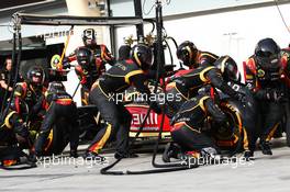 Romain Grosjean (FRA) Lotus F1 E21 makes a pit stop. 21.04.2013. Formula 1 World Championship, Rd 4, Bahrain Grand Prix, Sakhir, Bahrain, Race Day