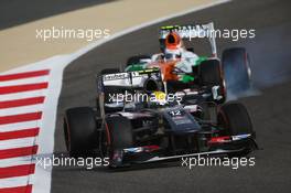 Esteban Gutierrez (MEX) Sauber C32 leads Adrian Sutil (GER) Sahara Force India VJM06. 21.04.2013. Formula 1 World Championship, Rd 4, Bahrain Grand Prix, Sakhir, Bahrain, Race Day