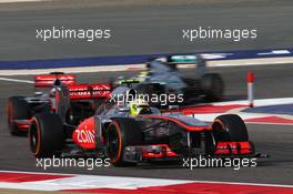 Sergio Perez (MEX) McLaren MP4-28 leads team mate Jenson Button (GBR) McLaren MP4-28. 21.04.2013. Formula 1 World Championship, Rd 4, Bahrain Grand Prix, Sakhir, Bahrain, Race Day