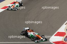 Paul di Resta (GBR) Sahara Force India VJM06 leads Adrian Sutil (GER) Sahara Force India VJM06. 21.04.2013. Formula 1 World Championship, Rd 4, Bahrain Grand Prix, Sakhir, Bahrain, Race Day