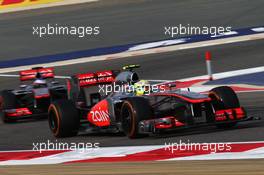 Sergio Perez (MEX) McLaren MP4-28 leads team mate Jenson Button (GBR) McLaren MP4-28. 21.04.2013. Formula 1 World Championship, Rd 4, Bahrain Grand Prix, Sakhir, Bahrain, Race Day