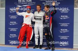 The top three qualifiers in Parc Ferme (L to R): Fernando Alonso (ESP) Ferrari, third; Nico Rosberg (GER) Mercedes AMG F1, pole position; Sebastian Vettel (GER) Red Bull Racing, second. 20.04.2013. Formula 1 World Championship, Rd 4, Bahrain Grand Prix, Sakhir, Bahrain, Qualifying Day