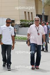 Lewis Hamilton (GBR) Mercedes AMG F1 with his manager Tom Shine (USA). 20.04.2013. Formula 1 World Championship, Rd 4, Bahrain Grand Prix, Sakhir, Bahrain, Qualifying Day