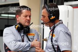 (L to R): Paul Hembery (GBR) Pirelli Motorsport Director with Mario Isola (ITA) Pirelli Racing Manager. 20.04.2013. Formula 1 World Championship, Rd 4, Bahrain Grand Prix, Sakhir, Bahrain, Qualifying Day