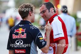 (L to R): Sebastian Vettel (GER) Red Bull Racing talks with Stefano Domenicali (ITA) Ferrari General Director. 20.04.2013. Formula 1 World Championship, Rd 4, Bahrain Grand Prix, Sakhir, Bahrain, Qualifying Day