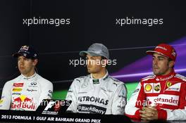 The top three qualifiers in the FIA Press Conference (L to R): Fernando Alonso (ESP) Ferrari, third; Nico Rosberg (GER) Mercedes AMG F1, pole position; Sebastian Vettel (GER) Red Bull Racing, second. 20.04.2013. Formula 1 World Championship, Rd 4, Bahrain Grand Prix, Sakhir, Bahrain, Qualifying Day