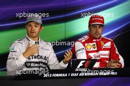 (L to R): Pole sitter Nico Rosberg (GER) Mercedes AMG F1 and Fernando Alonso (ESP) Ferrari in the FIA Press Conference. 20.04.2013. Formula 1 World Championship, Rd 4, Bahrain Grand Prix, Sakhir, Bahrain, Qualifying Day