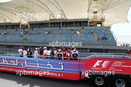 The drivers pass the fans in the grandstand. 21.04.2013. Formula 1 World Championship, Rd 4, Bahrain Grand Prix, Sakhir, Bahrain, Race Day
