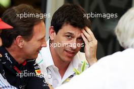 (L to R): Christian Horner (GBR) Red Bull Racing Team Principal with Toto Wolff (GER) Mercedes AMG F1 Shareholder and Executive Director, Bernie Ecclestone (GBR) CEO Formula One Group (FOM). 21.04.2013. Formula 1 World Championship, Rd 4, Bahrain Grand Prix, Sakhir, Bahrain, Race Day