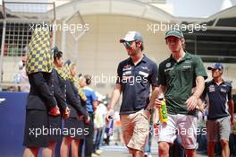 (L to R): Jean-Eric Vergne (FRA) Scuderia Toro Rosso and Charles Pic (FRA) Caterham on the drivers parade. 21.04.2013. Formula 1 World Championship, Rd 4, Bahrain Grand Prix, Sakhir, Bahrain, Race Day