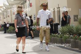 Lewis Hamilton (GBR) Mercedes AMG F1 with Nicola Armstrong (GBR) Mercedes AMG F1 Press Officer. 21.04.2013. Formula 1 World Championship, Rd 4, Bahrain Grand Prix, Sakhir, Bahrain, Race Day