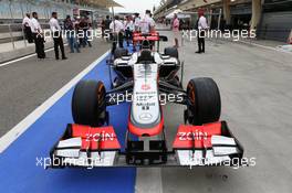 McLaren MP4-28 running Zain branding rather than Vodafone. 18.04.2013. Formula 1 World Championship, Rd 4, Bahrain Grand Prix, Sakhir, Bahrain, Preparation Day