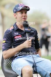 Sebastian Vettel (GER) Red Bull Racing. 18.04.2013. Formula 1 World Championship, Rd 4, Bahrain Grand Prix, Sakhir, Bahrain, Preparation Day