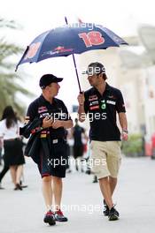 Jean-Eric Vergne (FRA) Scuderia Toro Rosso with Eric Silbermann (GBR) Scuderia Toro Rosso Press Officer. 18.04.2013. Formula 1 World Championship, Rd 4, Bahrain Grand Prix, Sakhir, Bahrain, Preparation Day