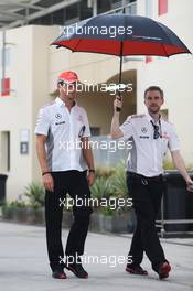 Jenson Button (GBR) McLaren with Steve Cooper (GBR) McLaren Press Officer. 18.04.2013. Formula 1 World Championship, Rd 4, Bahrain Grand Prix, Sakhir, Bahrain, Preparation Day