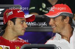 (L to R): Felipe Massa (BRA) Ferrari and Jenson Button (GBR) McLaren in the FIA Press Conference. 18.04.2013. Formula 1 World Championship, Rd 4, Bahrain Grand Prix, Sakhir, Bahrain, Preparation Day