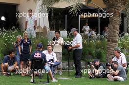 Will Buxton (GBR) NBS Sports Network TV Presenter with Sebastian Vettel (GER) Red Bull Racing. 18.04.2013. Formula 1 World Championship, Rd 4, Bahrain Grand Prix, Sakhir, Bahrain, Preparation Day
