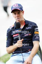 Sebastian Vettel (GER) Red Bull Racing. 18.04.2013. Formula 1 World Championship, Rd 4, Bahrain Grand Prix, Sakhir, Bahrain, Preparation Day