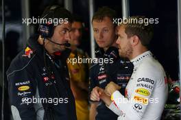 Sebastian Vettel (GER) Red Bull Racing with Guillaume Rocquelin (ITA) Red Bull Racing Race Engineer. 22.11.2013. Formula 1 World Championship, Rd 19, Brazilian Grand Prix, Sao Paulo, Brazil, Practice Day.