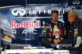 Sebastian Vettel (GER) Red Bull Racing with Dr Helmut Marko (AUT) Red Bull Motorsport Consultant. 22.11.2013. Formula 1 World Championship, Rd 19, Brazilian Grand Prix, Sao Paulo, Brazil, Practice Day.