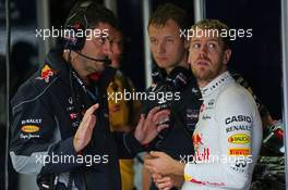 Sebastian Vettel (GER) Red Bull Racing with Guillaume Rocquelin (ITA) Red Bull Racing Race Engineer. 22.11.2013. Formula 1 World Championship, Rd 19, Brazilian Grand Prix, Sao Paulo, Brazil, Practice Day.