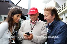 (L to R): Teresa Fittipaldi (BRA) with Niki Lauda (AUT) Mercedes Non-Executive Chairman and Emerson Fittipaldi (BRA). 24.11.2013. Formula 1 World Championship, Rd 19, Brazilian Grand Prix, Sao Paulo, Brazil, Race Day.