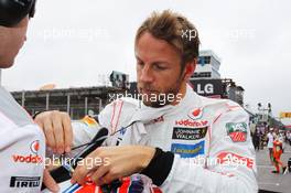 Jenson Button (GBR) McLaren on the grid. 24.11.2013. Formula 1 World Championship, Rd 19, Brazilian Grand Prix, Sao Paulo, Brazil, Race Day.