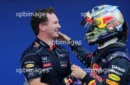 Christian Horner (GBR), Red Bull Racing, Sporting Director and Sebastian Vettel (GER), Red Bull Racing  24.11.2013. Formula 1 World Championship, Rd 19, Brazilian Grand Prix, Sao Paulo, Brazil, Race Day.
