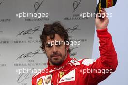 Fernando Alonso (ESP) Ferrari celebrates his third position on the podium. 24.11.2013. Formula 1 World Championship, Rd 19, Brazilian Grand Prix, Sao Paulo, Brazil, Race Day.