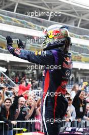 Race winner Sebastian Vettel (GER) Red Bull Racing celebrates in parc ferme. 24.11.2013. Formula 1 World Championship, Rd 19, Brazilian Grand Prix, Sao Paulo, Brazil, Race Day.