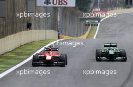 Jules Bianchi (FRA), Marussia Formula One Team  and Charles Pic (FRA), Catheram Formula One Team  24.11.2013. Formula 1 World Championship, Rd 19, Brazilian Grand Prix, Sao Paulo, Brazil, Race Day.