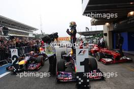 Race winner Sebastian Vettel (GER) Red Bull Racing RB9 celebrates in parc ferme. 24.11.2013. Formula 1 World Championship, Rd 19, Brazilian Grand Prix, Sao Paulo, Brazil, Race Day.