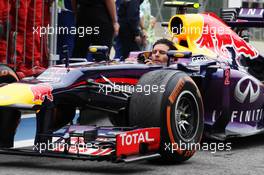 Second placed Mark Webber (AUS) Red Bull Racing RB9 arrives in parc ferme without his helmet. 24.11.2013. Formula 1 World Championship, Rd 19, Brazilian Grand Prix, Sao Paulo, Brazil, Race Day.