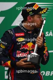 1st place Sebastian Vettel (GER) Red Bull Racing. 24.11.2013. Formula 1 World Championship, Rd 19, Brazilian Grand Prix, Sao Paulo, Brazil, Race Day.