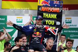 Mark Webber (AUS) Red Bull Racing celebrates his second position and final GP with the team. 24.11.2013. Formula 1 World Championship, Rd 19, Brazilian Grand Prix, Sao Paulo, Brazil, Race Day.