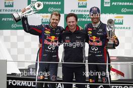(L to R): race winner Sebastian Vettel (GER) Red Bull Racing with Christian Horner (GBR) Red Bull Racing Team Principal and second placed Mark Webber (AUS) Red Bull Racing, who finished his last GP. 24.11.2013. Formula 1 World Championship, Rd 19, Brazilian Grand Prix, Sao Paulo, Brazil, Race Day.