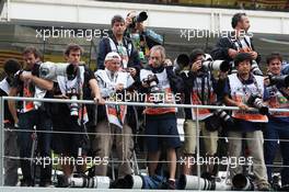 Photographers at the podium. 24.11.2013. Formula 1 World Championship, Rd 19, Brazilian Grand Prix, Sao Paulo, Brazil, Race Day.