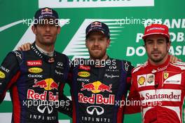 1st place Sebastian Vettel (GER) Red Bull Racing, 2nd place Mark Webber (AUS) Red Bull Racing and 3rd Fernando Alonso (ESP) Ferrari F138. 24.11.2013. Formula 1 World Championship, Rd 19, Brazilian Grand Prix, Sao Paulo, Brazil, Race Day.