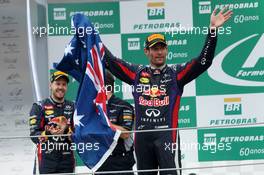 Mark Webber (AUS) Red Bull Racing celebrates his second position and his final GP on the podium. 24.11.2013. Formula 1 World Championship, Rd 19, Brazilian Grand Prix, Sao Paulo, Brazil, Race Day.