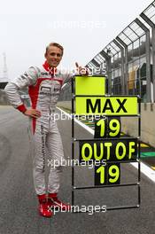Max Chilton (GBR) Marussia F1 Team celebrates his 100% GP finishing record. 24.11.2013. Formula 1 World Championship, Rd 19, Brazilian Grand Prix, Sao Paulo, Brazil, Race Day.
