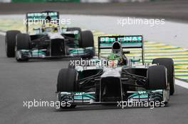 Lewis Hamilton (GBR) Mercedes AMG F1 W04 leads team mate Nico Rosberg (GER) Mercedes AMG F1 W04. 24.11.2013. Formula 1 World Championship, Rd 19, Brazilian Grand Prix, Sao Paulo, Brazil, Race Day.